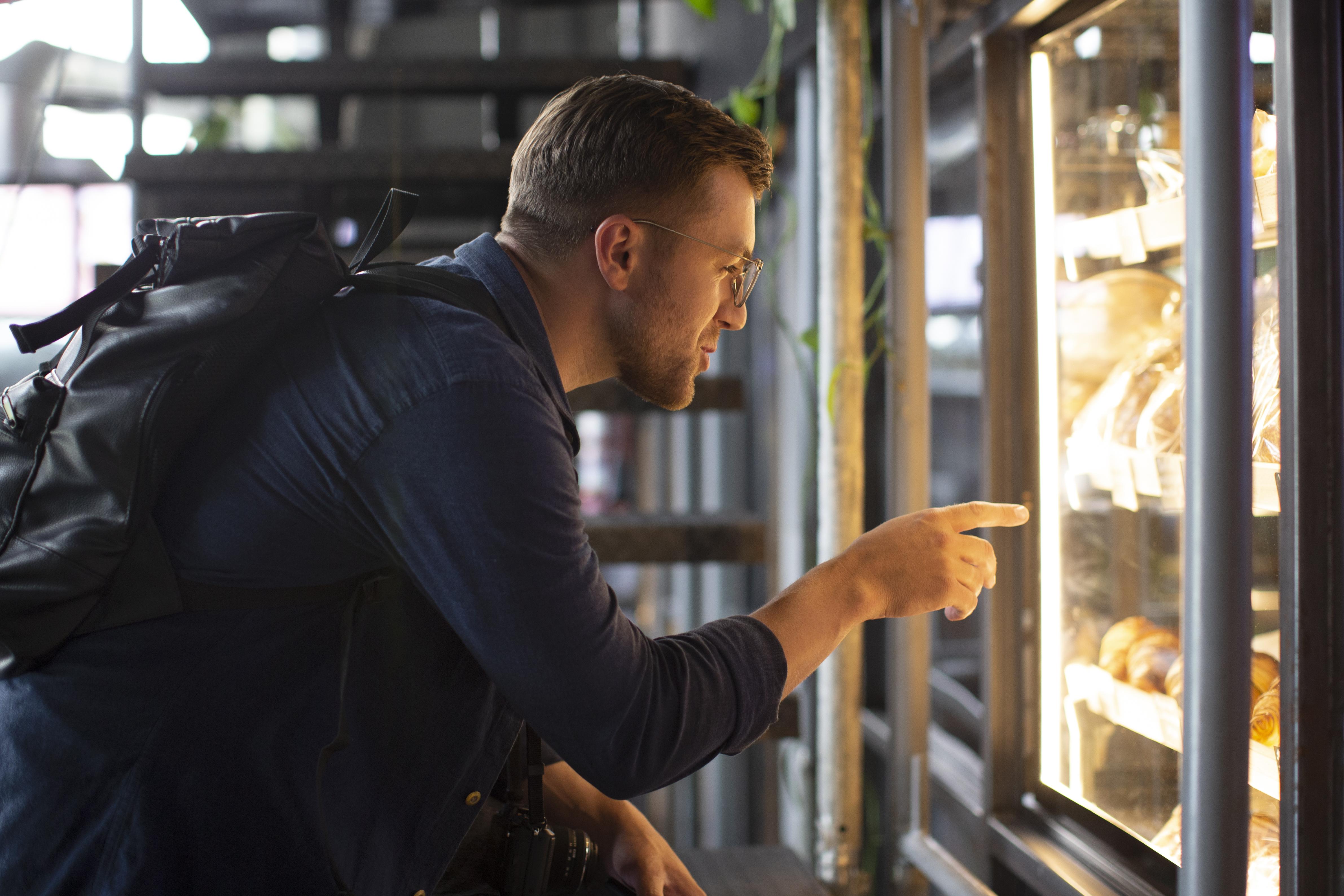 Man at vending machine